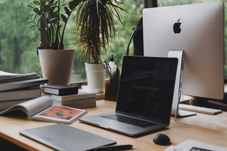 organized desk in morning sunlight with notebook and peaceful workspace, exemplifying the discipline and clarity of early morning writing sessions