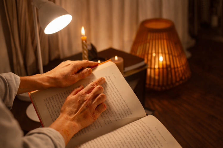 Open book with glowing pages representing the illumination of narrative meaning through ambiguous storytelling